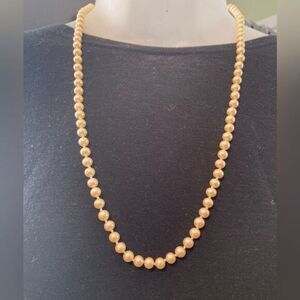 Vintage faux pearl necklace 24” length beautiful clasp